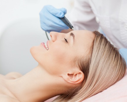 women getting skin treatment