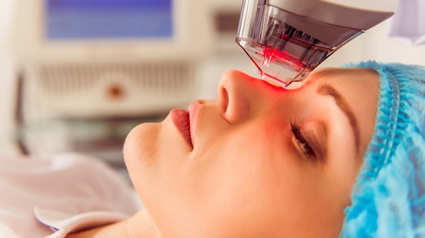 A woman getting a skin laser treatment