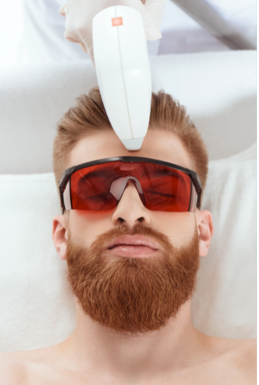 man receiving LED Light Therapy skin treatment